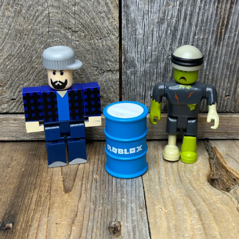 Roblox Zombie Attack - Survivor‎ and Zombie Figures and Blue Barrel Accessory
